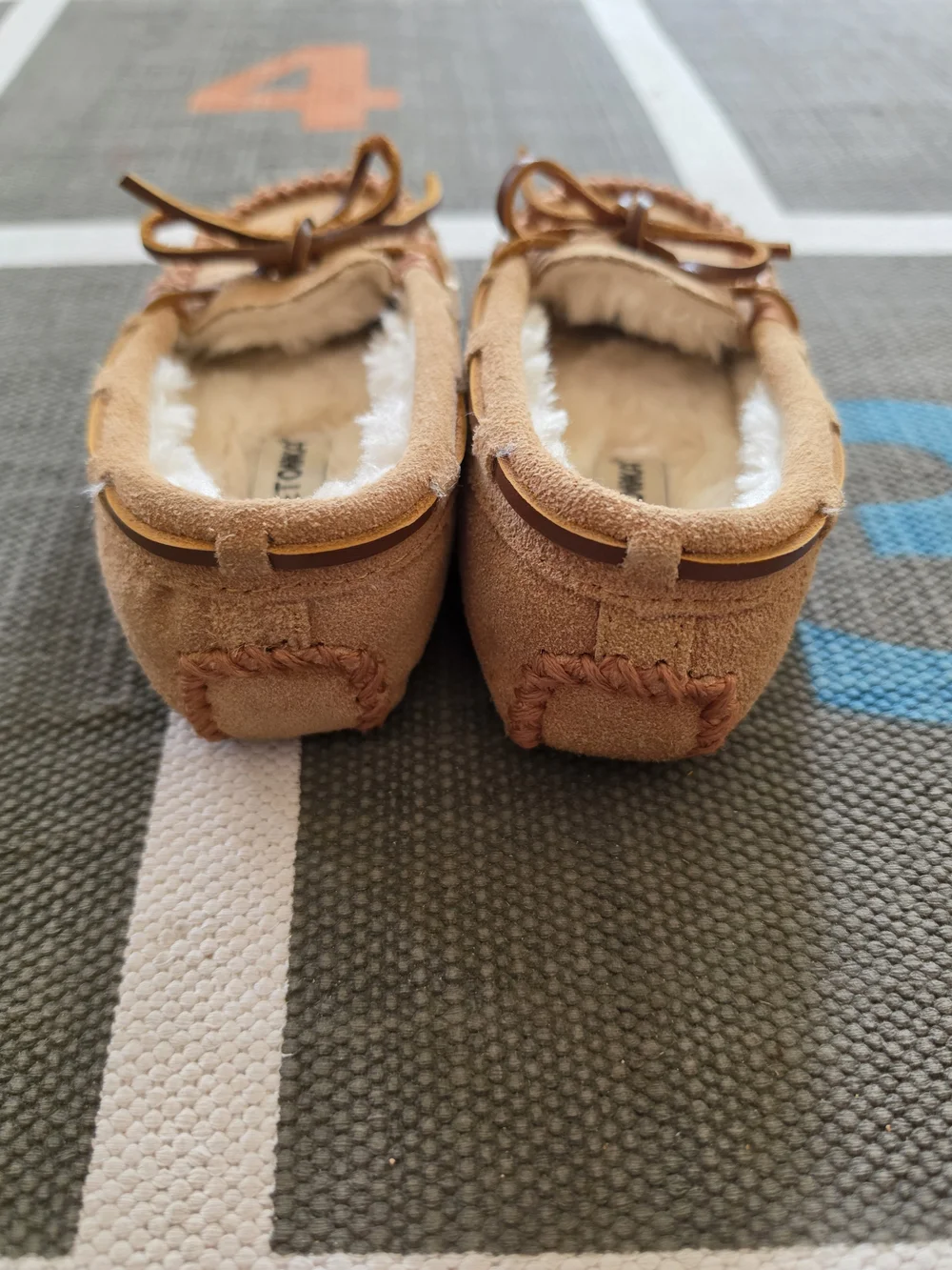 Minnetonka Kids Tan Suede Moccasin Slippers with Faux Fur
